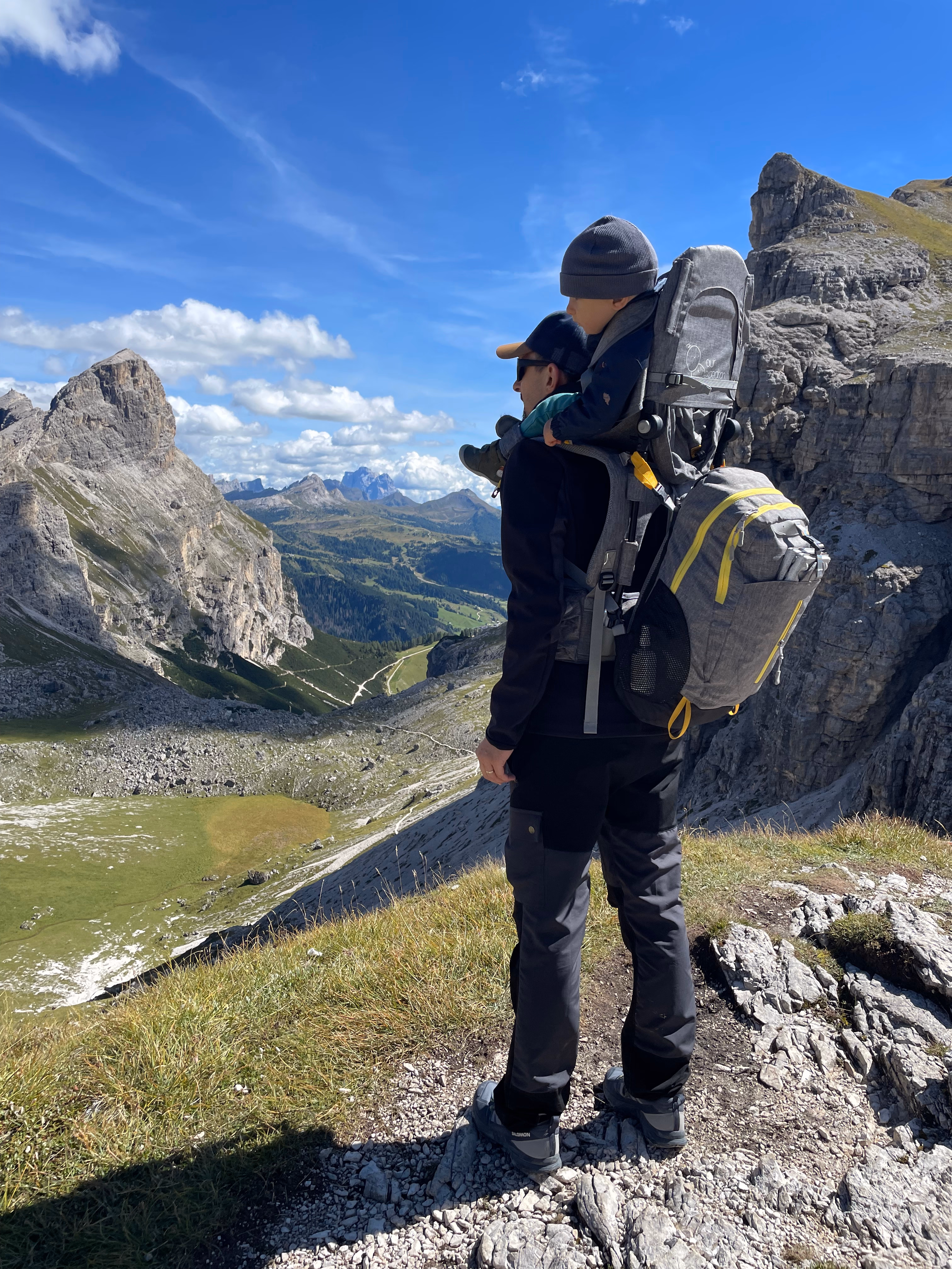 Alex carrying Edi on his shoulders in the Dolomites